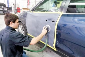 Sanding a car door for painting